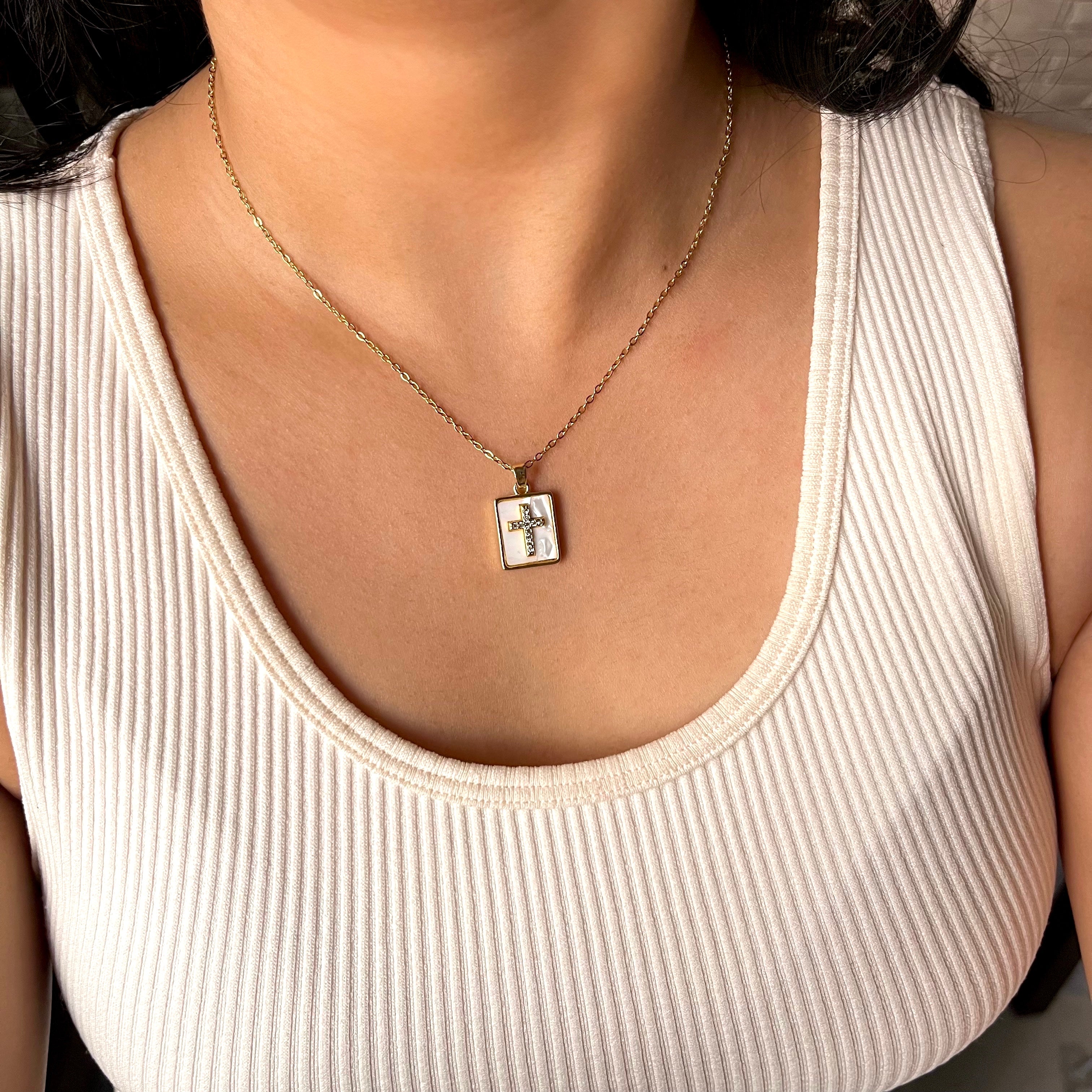 CROSS SHELL NECKLACE